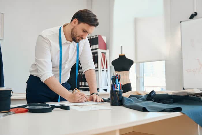 Tech pack: designer sketching at an office