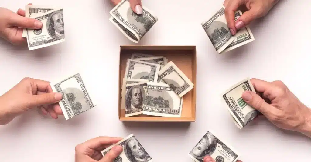 Crowd funding campaign illustration with people placing cash into a shared box to support a new product.